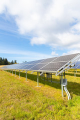 Solar energy panels outside at electricity farm