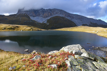 Russia, Arkhyz. Atsgarskoye lake, one of the lakes  of Zagedanskoye Pyatiozerye in cloudy weather