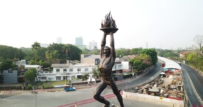 JAKARTA, Indonesia - October 03, 2018: Aerial view of Patung Pemuda Membangun or Youth Advancement Monument or simply Youth Monument at Senaya Roundabout, Jakarta, Indonesia.