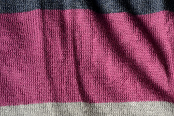 Knitted fabric texture and background close up