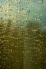 background of raindrops on window glass, close up