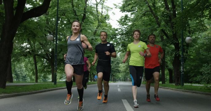 Group Of People Exercising Together