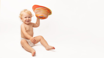 Cute smiling baby girl with hat isolated on white background