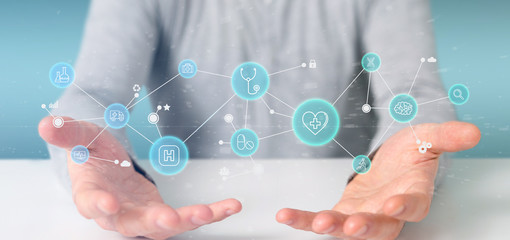 Businessman holding Medical icon and connection 3d rendering
