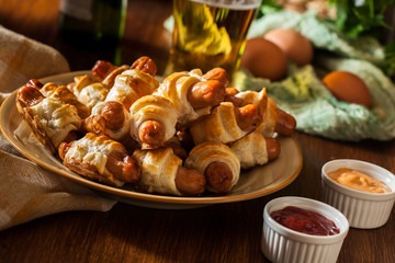 Pigs in blankets. Dark mood
