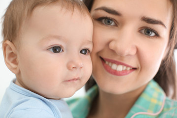 Loving mother with her baby, closeup