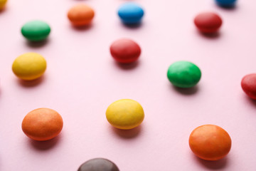 Fototapeta na wymiar Tasty glazed candies on color background, closeup
