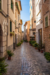 Pictoresque mediterranean street in Soller. Port de Soller, is a village and the port of the town of Soller, in Mallorca, in the Balearic Islands, Spain.