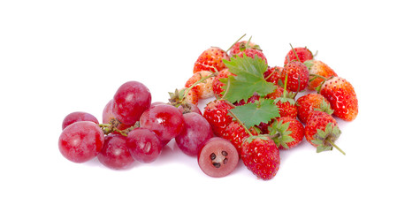 Mix of ripe sweet fruits and berries isolated on white