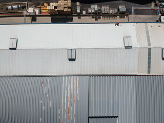 Aerial view from a factory building, wharehouse. Drone photo