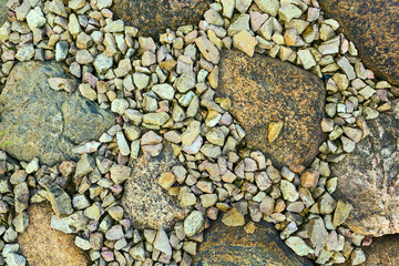 Overhead view of rubble and stone texture.
