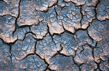 Cracked earth soil background