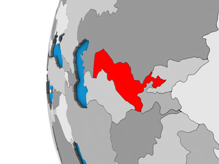 Fototapeta premium Uzbekistan on blue political 3D globe.