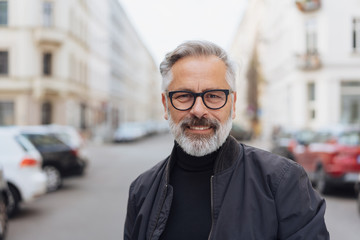 Smiling middle-aged man with a friendly smile