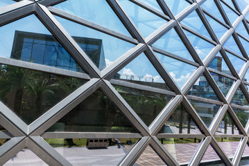 Skyscraper metal frames and glass windows close-up