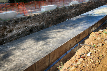 Modern main heating supply line covered with concrete reinforced precast concrete box culverts and...