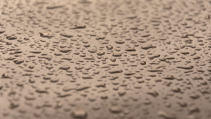 raindrops on a gray surface