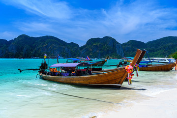 Fototapeta na wymiar Long tail boats on tropical beach, Phi Phi Don island, Andaman s