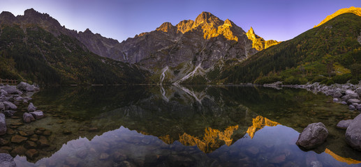 Panorama of a mountain lake during sunrise - Morskie Oko, Tatra Mountains, Poland - obrazy, fototapety, plakaty