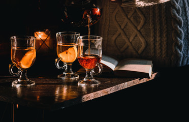 Woman gives some tea in a glass
