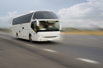 Fototapeta na wymiar Blurred image of a moving bus
