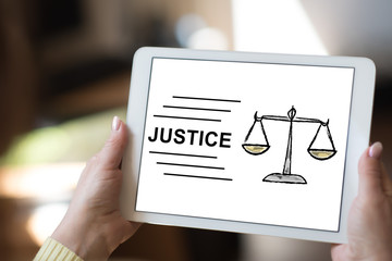 Justice concept on a tablet