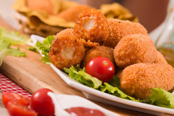Supplì, italian fried rice balls.