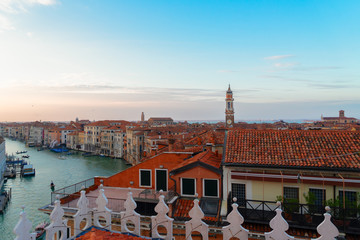 Fototapeta na wymiar Sunset over Venice - roofs of old houses, Venice Italy