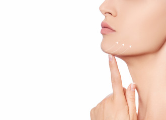 Cropped Face of beautiful woman with perfect skin , with lifting arrows on neck and chin line....