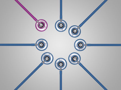 Pink and blue stethoscopes in a circle