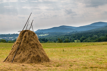 hay stack in mountains