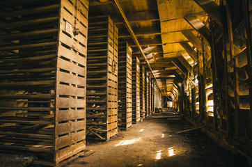 A hallway in a old factory in the Netherlands that was used in the early 50's. This factory was used to make roof tiles, and now it is abandoned for a long time.