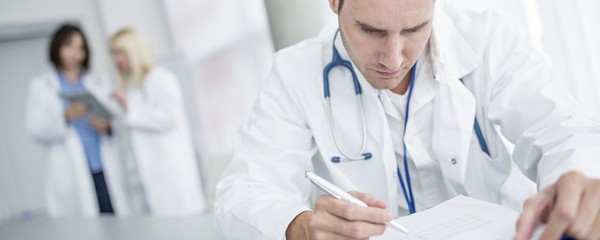 Doctor doing paperwork