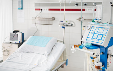 Take care of your health. Recovery room in white tones with mechanical ventilator and digital...