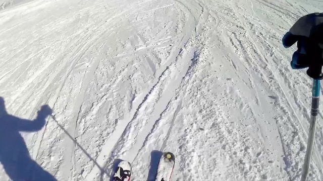 Skiing on ski slopes at Tignes, ski resort in the Alps, France. Video HD