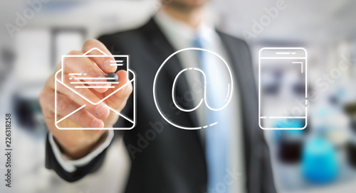 Businessman drawing thin line contact icon