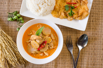 Delicious red curry chicken bamboo shoots with omelet and cooked rice,Thai food style