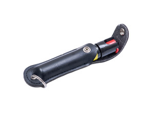 Self defense pepper spray in case isolated on white background