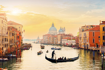 Grand canal and Basilica Santa Maria della Salute, Venice in pink sunrise light, Italy