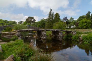 Fototapeta na wymiar Clapper Bridge in british moorland Dartmoor