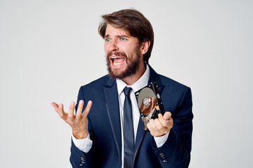 man with a hard disk in his hand