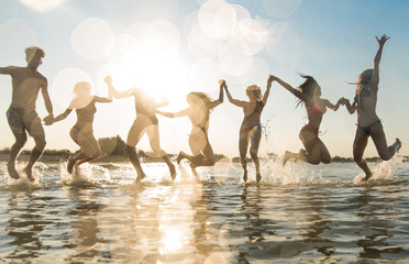 Friends having fun at the sea