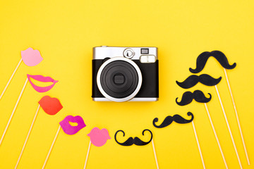 Photo booth props and instant camera
