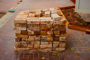 Recicling of red bricks. Old used redbricks ready to next use