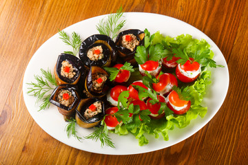Stuffed eggplant and tomato