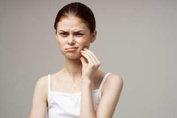 woman looking in disgust at the camera