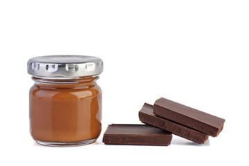 Glass jar with chocolate spred and three pieces