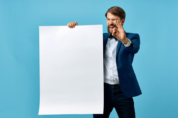 emotional man holding a sheet of paper in his hand