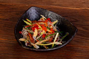 Asian salad with salmon skin