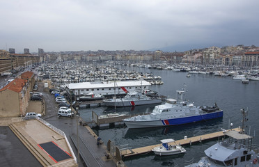 Aerial panoramic view on basilica of Notre Dame de la Garde and old port in Marseille, France